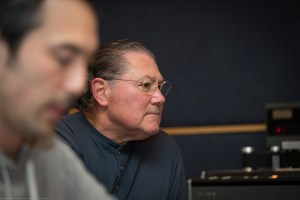 Sound engineer Jon Chi and studio owner Ken Krei listen to a track.