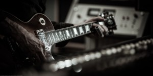 Tyler Famularo lays down a slide guitar track on his Gibson.